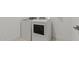This laundry room features modern washer and dryer units at 8000 W Griswold Rd, Peoria, AZ 85345
