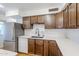 Kitchen features stainless appliances, white countertop, and subway tile backsplash at 8713 E Sage Dr, Scottsdale, AZ 85250