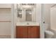 Bathroom featuring vanity and shower with tub at 9243 W Brown St, Peoria, AZ 85345