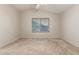 Large bedroom with ceiling fan and window with blinds at 9243 W Brown St, Peoria, AZ 85345