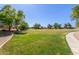 Well-manicured green space within the community, ideal for outdoor activities, surrounded by walking paths at 9243 W Brown St, Peoria, AZ 85345