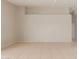 Neutral living room featuring tile floors, neutral walls, base molding, and ample electric outlets at 9243 W Brown St, Peoria, AZ 85345