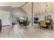 Spacious living room featuring vaulted ceilings, wood flooring, and an open concept at 9432 E Quail Trl, Carefree, AZ 85377