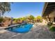 Backyard featuring a private pool, patio area, desert landscaping, and views at 9432 E Quail Trl, Carefree, AZ 85377