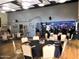 Restaurant interior with tables, chairs, and bar in the background at 10102 E Michigan Ave, Sun Lakes, AZ 85248