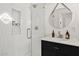 Bathroom showcasing glass shower and built in shelving at 10205 E Corrine Dr, Scottsdale, AZ 85260