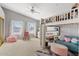Bright bedroom with loft bed, desk, and plenty of storage at 10205 E Corrine Dr, Scottsdale, AZ 85260