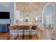 Large kitchen features a breakfast bar, white cabinets, and an open layout at 10205 E Corrine Dr, Scottsdale, AZ 85260