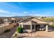 Aerial view showcasing the property's outdoor living spaces, desert landscaping, and peaceful surroundings at 10607 E Hillside Mine Ct, Gold Canyon, AZ 85118