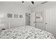 This bedroom boasts wood-look floors, a closet, ensuite bathroom and a window overlooking the side yard at 10607 E Hillside Mine Ct, Gold Canyon, AZ 85118