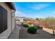 Front yard with desert landscaping and views of the mountains in the distance on a sunny day at 10607 E Hillside Mine Ct, Gold Canyon, AZ 85118