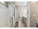 Bathroom with glass enclosed shower, attractive floors and vanity at 1281 W Highland Rd, San Tan Valley, AZ 85143