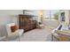 Cozy bedroom featuring plush carpeting, a window, and a stylish murphy bed at 1281 W Highland Rd, San Tan Valley, AZ 85143