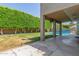 Expansive backyard featuring covered patio, pool, and mature landscaping at 12813 S 38Th St, Phoenix, AZ 85044