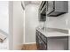 Home bar with dark cabinets, light countertops, and wine storage at 12813 S 38Th St, Phoenix, AZ 85044
