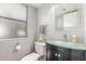 Modern bathroom with toilet, sink, and mirrored window at 12813 S 38Th St, Phoenix, AZ 85044