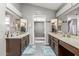 Bathroom with double sinks, lots of counter space and a tiled walk-in shower at 12813 S 38Th St, Phoenix, AZ 85044