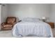 Comfortable bedroom featuring a plush armchair, neutral walls, and soft carpeting at 12813 S 38Th St, Phoenix, AZ 85044
