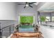 Contemporary dining room with vaulted ceilings and a large window overlooking a lush yard at 12813 S 38Th St, Phoenix, AZ 85044