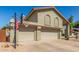 Charming home with a basketball hoop, three-car garage, and desert landscaping at 12813 S 38Th St, Phoenix, AZ 85044