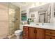 Bathroom featuring a modern vanity and glass shower, offering a clean and stylish design at 145 N 74Th St # 251, Mesa, AZ 85207