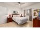 Comfortable bedroom with a ceiling fan, complemented by natural light streaming through the window at 145 N 74Th St # 251, Mesa, AZ 85207