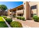 The exterior of this condo has tidy desert landscaping with staircase entryway to the units at 145 N 74Th St # 251, Mesa, AZ 85207