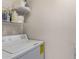 Laundry room with washer and shelving at 145 N 74Th St # 251, Mesa, AZ 85207