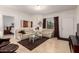 Bright and airy living room featuring neutral tones, tile flooring, and comfortable seating at 145 N 74Th St # 251, Mesa, AZ 85207