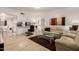 Bright living room featuring a modern kitchen and comfortable seating at 145 N 74Th St # 251, Mesa, AZ 85207