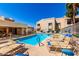 Community swimming pool with lounge chairs at 145 N 74Th St # 251, Mesa, AZ 85207