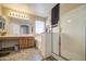 Bright bathroom with double sinks, a tub, and a walk-in shower at 1937 W Burgess Ln, Phoenix, AZ 85041