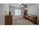 Functional bedroom space with a built-in desk and ample storage at 1937 W Burgess Ln, Phoenix, AZ 85041