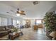 Open floor plan showcasing a seamless flow between the living room, dining area, and kitchen at 1937 W Burgess Ln, Phoenix, AZ 85041