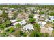 Overhead view of a residential area with palm trees and the city skyline in the background at 2041 N 16Th Ave, Phoenix, AZ 85007