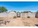 Gated backyard featuring a secure entrance, offering privacy and security at 2041 N 16Th Ave, Phoenix, AZ 85007