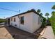 Exterior shot of the home featuring desert landscaping and a covered patio at 2041 N 16Th Ave, Phoenix, AZ 85007