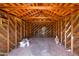 Interior of detached garage with exposed wooden framing, offering ample storage and workspace potential at 2041 N 16Th Ave, Phoenix, AZ 85007