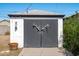 Charming detached garage with unique exterior details, offering secure parking and storage space at 2041 N 16Th Ave, Phoenix, AZ 85007