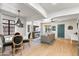 Bright, open-concept living room and dining area with modern decor and plenty of light at 2041 N 16Th Ave, Phoenix, AZ 85007
