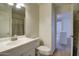 Bathroom featuring white vanity, neutral walls, and tile flooring at 218 E Milada Dr, Phoenix, AZ 85042