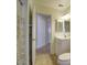 Bathroom with white vanity, decorative shower curtain, and tile flooring at 218 E Milada Dr, Phoenix, AZ 85042
