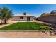 Backyard featuring a freshly landscaped grass patch at 2443 E Randall Dr, Tempe, AZ 85288