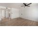 Bedroom boasting fresh paint, new ceiling fan, and hardwood flooring at 2443 E Randall Dr, Tempe, AZ 85288