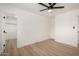 Bedroom featuring ceiling fan and closet at 2443 E Randall Dr, Tempe, AZ 85288
