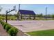 Community basketball court with picnic pavilion and manicured landscaping at 2519 E Fortana Dr, San Tan Valley, AZ 85143