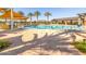 Exterior shot of the community pool area featuring a splash pool, lounge chairs and shaded areas at 2519 E Fortana Dr, San Tan Valley, AZ 85143