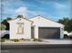 Charming single-story home featuring a two-car garage and low-maintenance desert landscaping at 2519 E Fortana Dr, San Tan Valley, AZ 85143