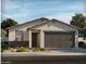Charming single-story home features a two-car garage, neutral color palette, and well-maintained landscaping at 2577 E Fortana Dr, San Tan Valley, AZ 85143