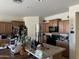 Spacious kitchen featuring granite countertops, stainless steel appliances, and wooden cabinets at 25931 W Deer Valley Rd, Buckeye, AZ 85396